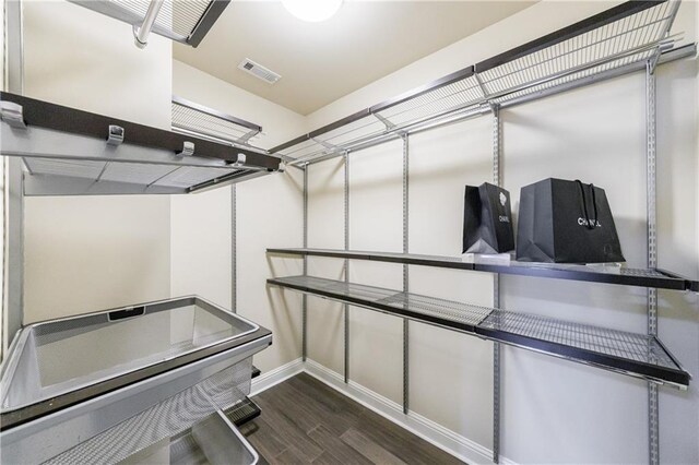 359 Alderwood Ln, Atlanta, GA 30328 - walk in closet featuring dark wood-type flooring