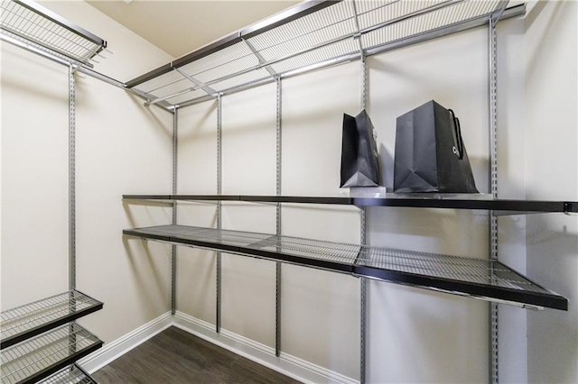 359 Alderwood Ln, Atlanta, GA 30328 - walk in closet featuring dark wood-type flooring