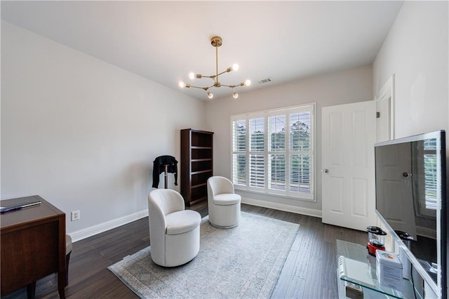 359 Alderwood Ln, Atlanta, GA 30328 - living area featuring a chandelier, baseboards, and dark wood finished floors