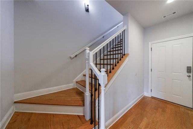 359 Alderwood Ln, Atlanta, GA 30328 - staircase featuring wood finished floors and baseboards