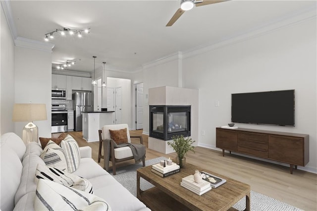 401 16th St NW Unit 1357, Atlanta, GA 30363 - living area with ceiling fan, ornamental molding, light wood finished floors, and a multi sided fireplace