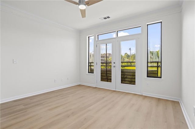 401 16th St NW Unit 1357, Atlanta, GA 30363 - empty room with crown molding, light wood finished floors, ceiling fan, and french doors