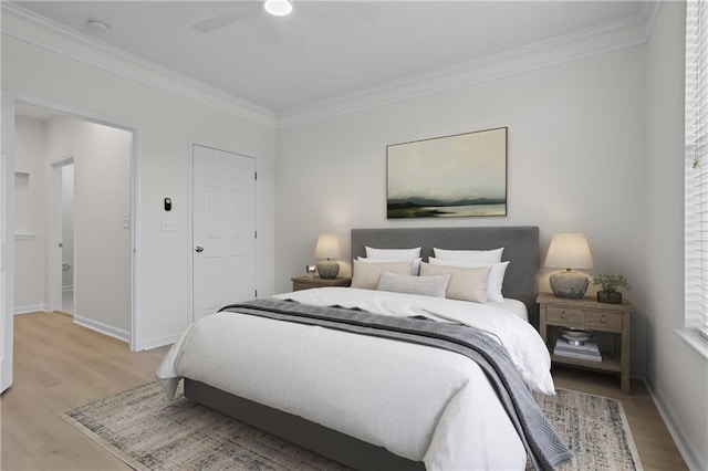 401 16th St NW Unit 1357, Atlanta, GA 30363 - bedroom with crown molding, light wood finished floors, and a ceiling fan