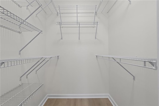 401 16th St NW Unit 1357, Atlanta, GA 30363 - walk in closet featuring wood finished floors