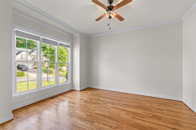 unfurnished room with light wood-type flooring, baseboards, and visible vents