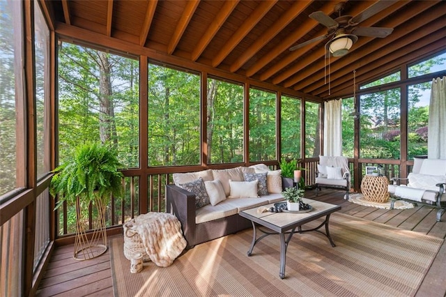 sunroom / solarium with ceiling fan and outdoor lounge area