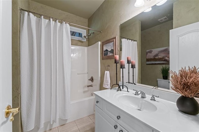 bathroom with vanity, shower / bath combo with shower curtain, tile patterned floors, toilet, and visible vents