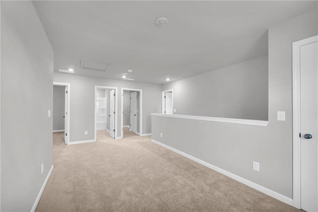 empty room with light colored carpet