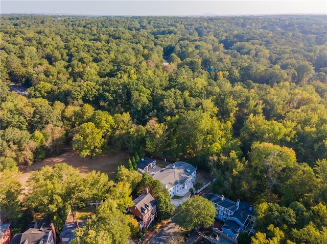 bird's eye view featuring a forest view