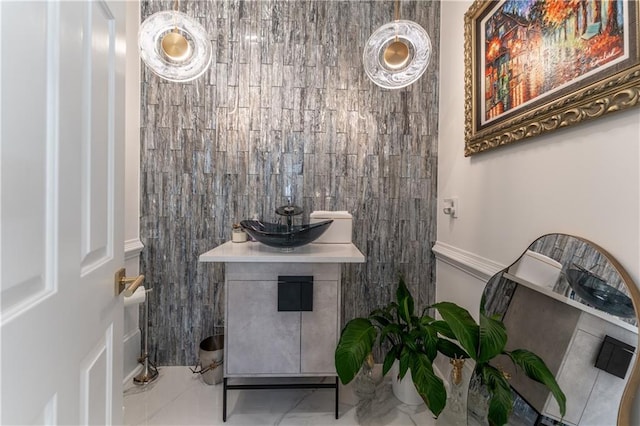 bathroom featuring marble finish floor