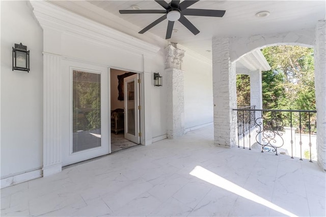 view of patio featuring ceiling fan