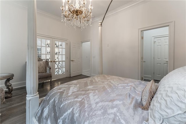 bedroom featuring wood finished floors, baseboards, ornamental molding, french doors, and a notable chandelier