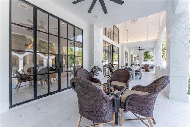 view of patio / terrace with french doors and a ceiling fan