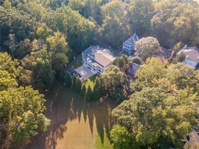 drone / aerial view with a forest view