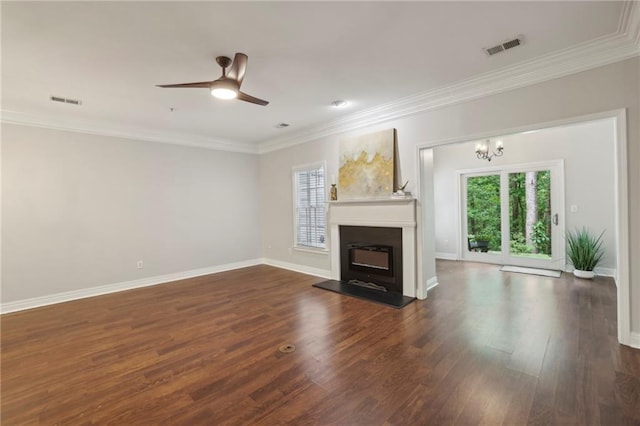 3992 Camden Way, Alpharetta, GA 30005 - unfurnished living room featuring dark wood finished floors, crown molding, ceiling fan, baseboards, and a glass covered fireplace