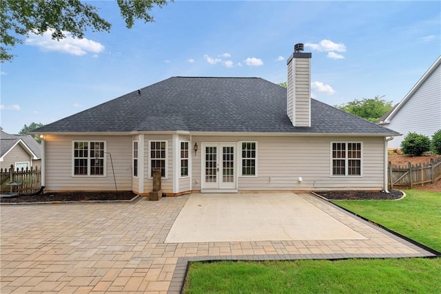 3549 Daventry Ln NW, Kennesaw, GA 30144 - back of house with french doors, a patio area, and a chimney