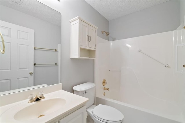 3549 Daventry Ln NW, Kennesaw, GA 30144 - bathroom with a textured ceiling, vanity, and  shower combination