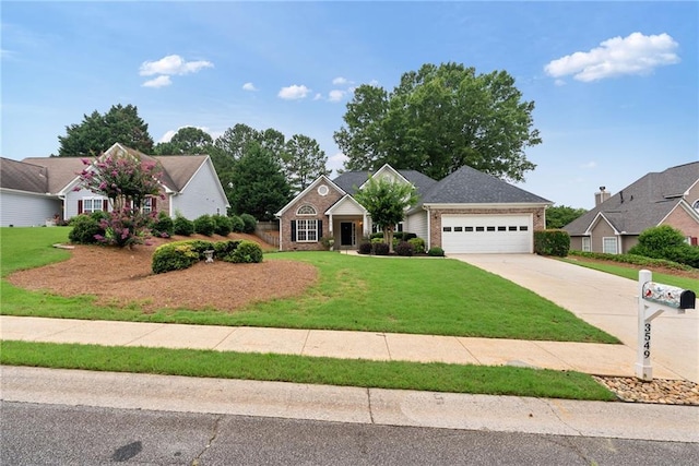 3549 Daventry Ln NW, Kennesaw, GA 30144 - view of front of property with a garage, concrete driveway, brick siding, and a front lawn
