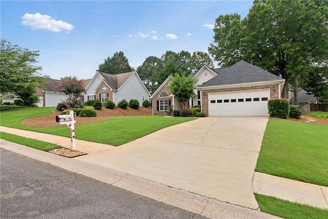 3549 Daventry Ln NW, Kennesaw, GA 30144 - view of front of house with a front yard, brick siding, an attached garage, and concrete driveway
