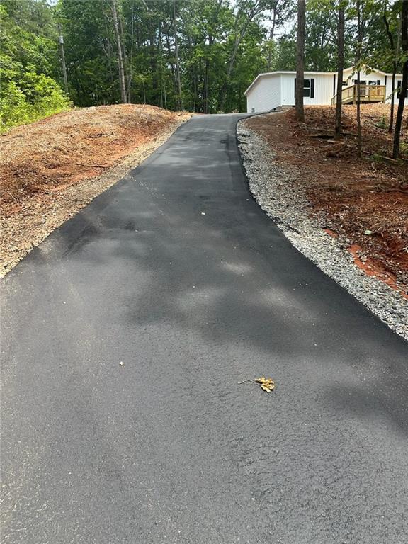 551 Fern Valley Trl NE, Clarkesville, GA 30523 - view of asphalt driveway