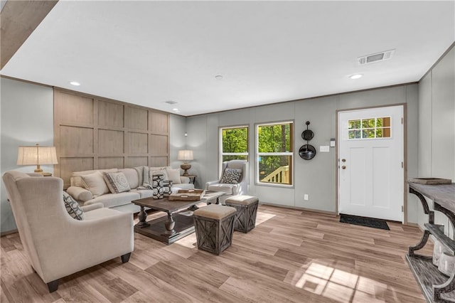 551 Fern Valley Trl NE, Clarkesville, GA 30523 - living room featuring a decorative wall, light wood finished floors, and recessed lighting
