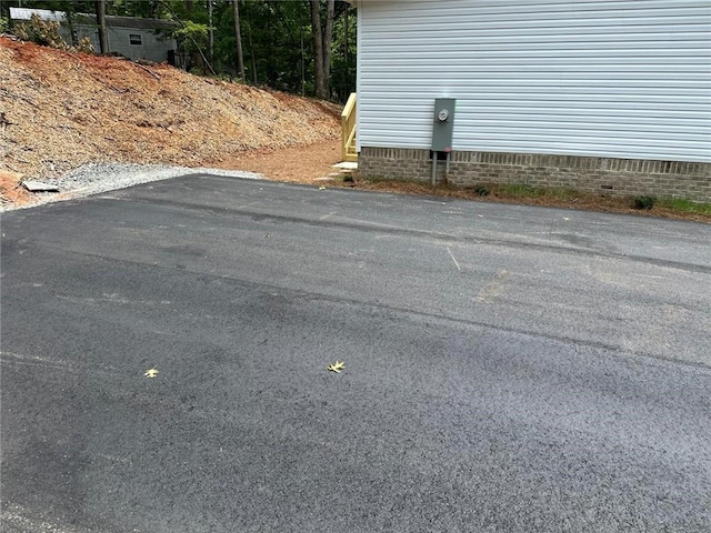 551 Fern Valley Trl NE, Clarkesville, GA 30523 - exterior view of electric meter and crawl space