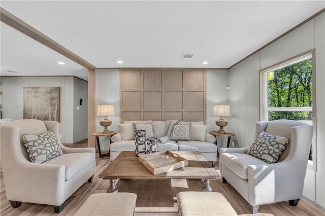 551 Fern Valley Trl NE, Clarkesville, GA 30523 - living room with light wood-style floors, recessed lighting, and a decorative wall