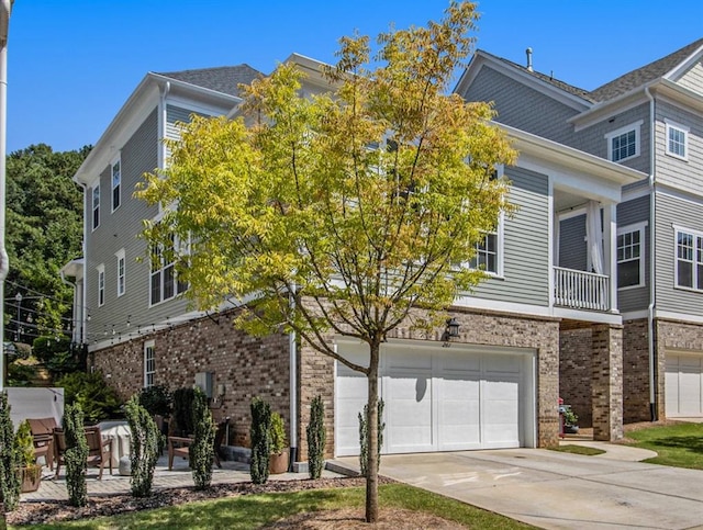 view of front of property featuring a garage