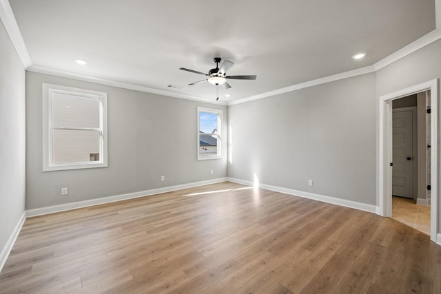 empty room with light wood finished floors, ceiling fan, baseboards, ornamental molding, and recessed lighting