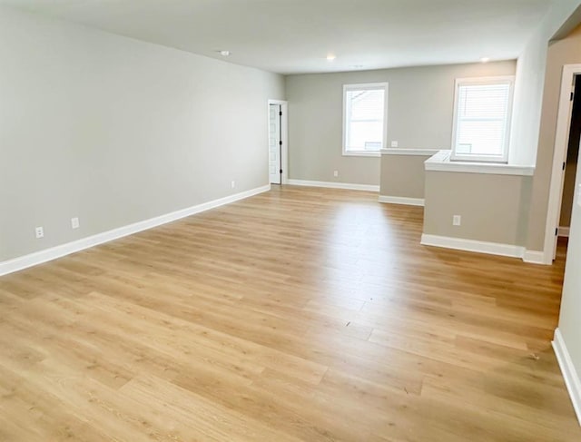 5816 Gainesville St, Flowery Branch, GA 30542 - empty room featuring baseboards and light wood-type flooring