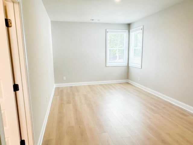5816 Gainesville St, Flowery Branch, GA 30542 - unfurnished room featuring light wood-style flooring and baseboards