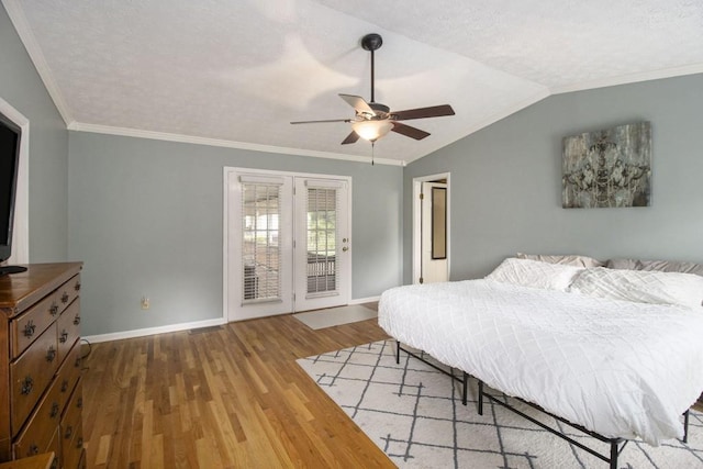1134 Roscoe Rd, Newnan, GA 30263 - bedroom featuring access to exterior, wood finished floors, lofted ceiling, ornamental molding, and a ceiling fan