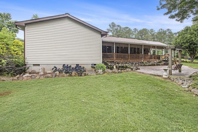 1134 Roscoe Rd, Newnan, GA 30263 - rear view of house with a patio, a sunroom, a lawn, and crawl space