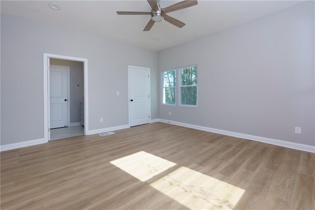 unfurnished bedroom featuring light hardwood / wood-style flooring and ceiling fan