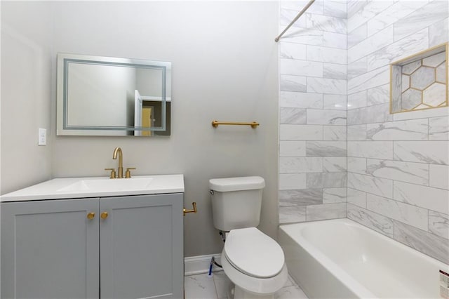 full bathroom featuring vanity, tiled shower / bath combo, and toilet