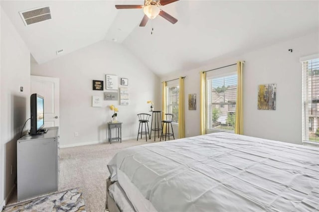 carpeted bedroom featuring ceiling fan, lofted ceiling, and multiple windows