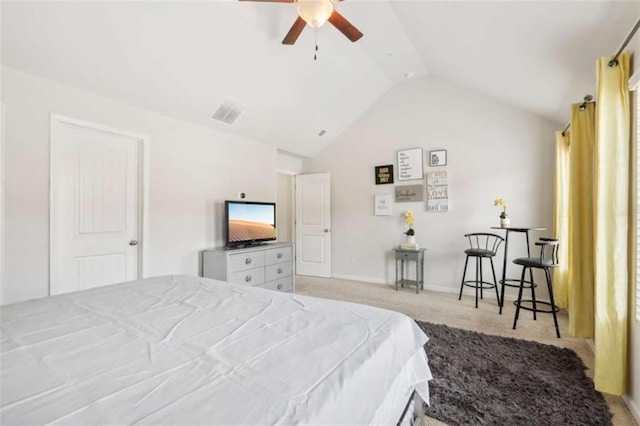 bedroom with lofted ceiling, light colored carpet, and ceiling fan