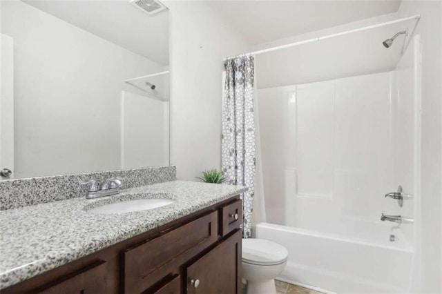 full bathroom featuring vanity, toilet, and shower / bath combo