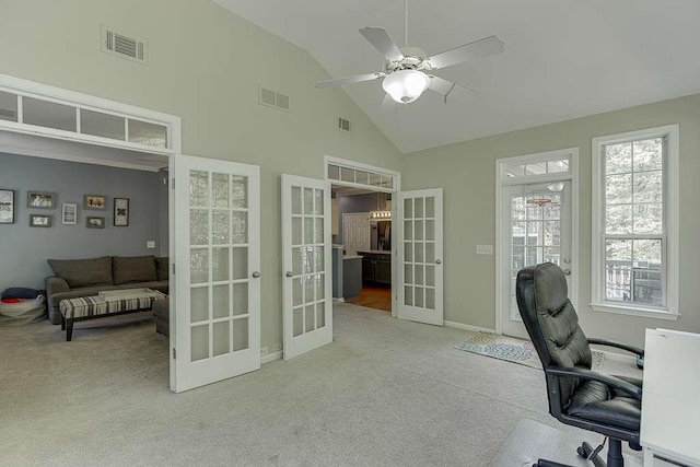 office space with french doors, visible vents, high vaulted ceiling, ceiling fan, and carpet floors