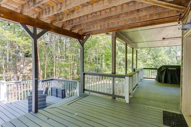 wooden terrace with grilling area