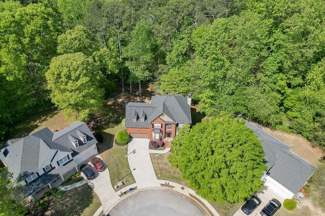 aerial view featuring a forest view