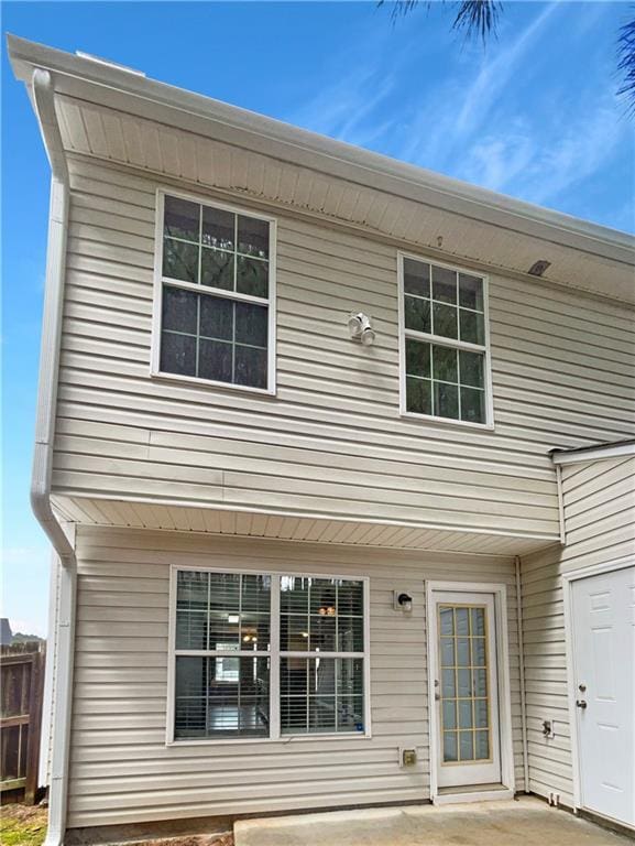 453 Inkberry Dr, Atlanta, GA 30349 - rear view of house with a patio