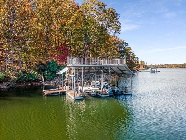 view of dock with a water view