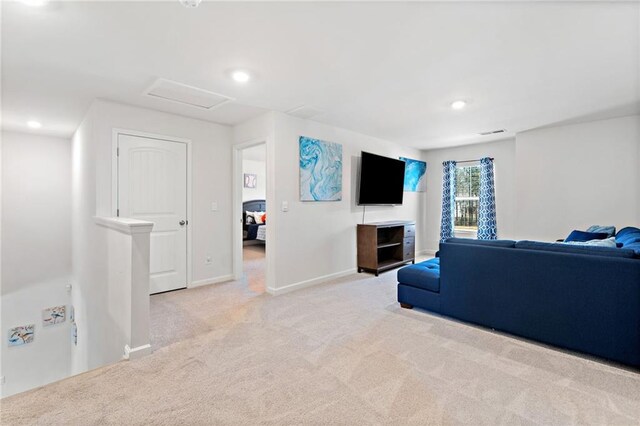 174 Sienna Blf, Dallas, GA 30132 - living room with carpet flooring, visible vents, baseboards, recessed lighting, and attic access