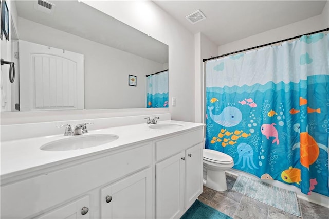 174 Sienna Blf, Dallas, GA 30132 - full bathroom featuring toilet, a sink, and visible vents
