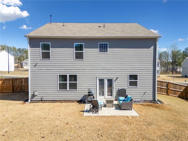 174 Sienna Blf, Dallas, GA 30132 - back of house featuring a fenced backyard, a lawn, a patio, and outdoor lounge area
