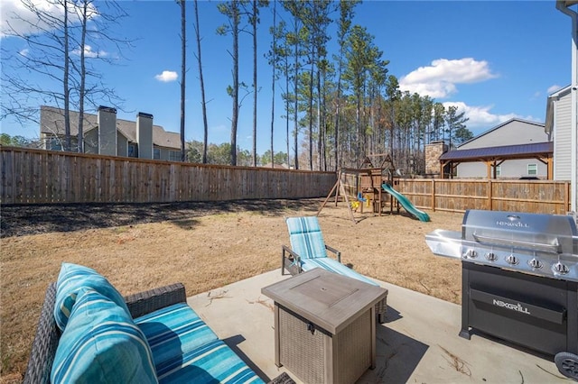 174 Sienna Blf, Dallas, GA 30132 - view of yard with a fenced backyard, a playground, and a patio area
