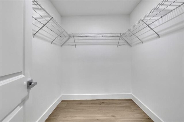 1770 Austin Dr, Decatur, GA 30032 - spacious closet featuring wood finished floors