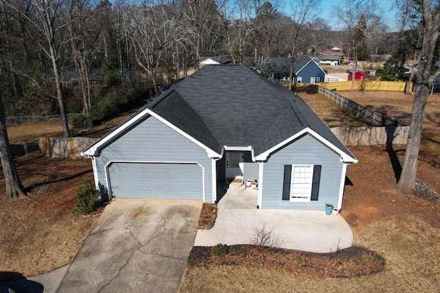 view of front of property with a garage