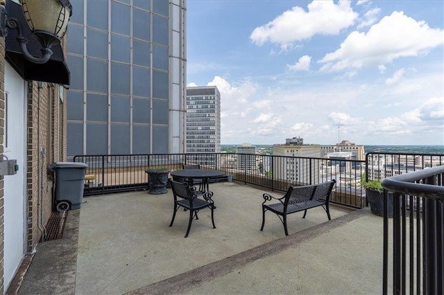 view of patio / terrace with a balcony